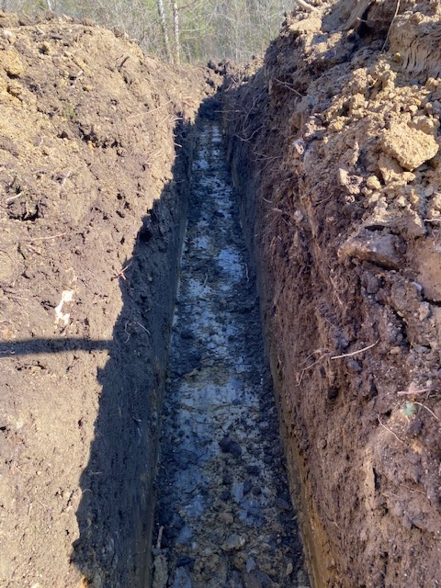 Défrichage terrain pour fosse épandage